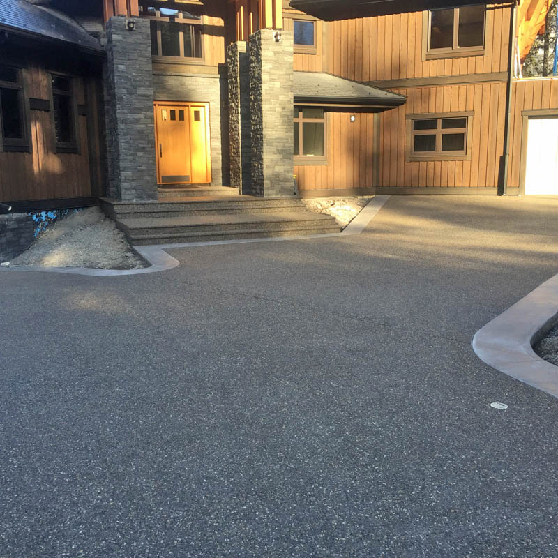 exposed aggregate driveway by Competition Concrete, greater Calgary and Canmore